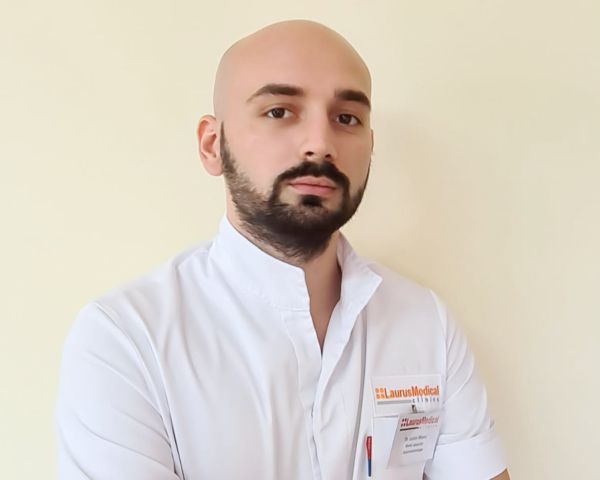 Dr. Iustin Moroi Dr. Iustin Moroi